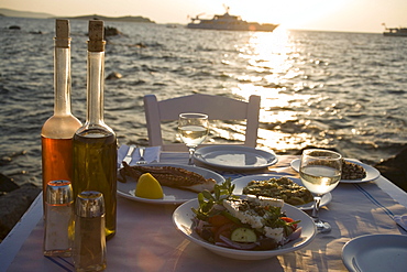 Different greek starters, including salat, served in the Sea Satin Market Restaurant, Mykonos-Town, Mykonos, Greece