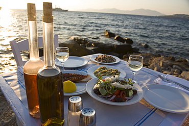 Different greek starters, including salat, served in the Sea Satin Market Restaurant, Mykonos-Town, Mykonos, Greece