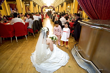 Wedding party in Peace Hotel, White wedding, Peace Hall, interior, bride with kids, banquet