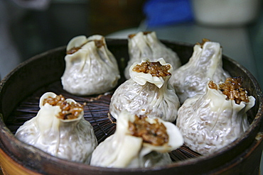 rice dumplings in Bamboo steamer, close-up, China