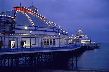 Pier and beach at night, Eastbourne, England00058431