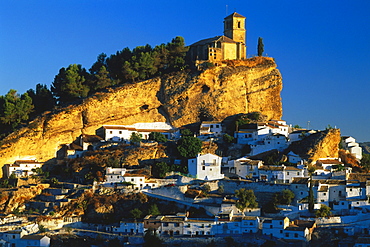 Houses and church of the village of Montefrio in the sunlight, Granada province, Andalusia, Spain, Europe