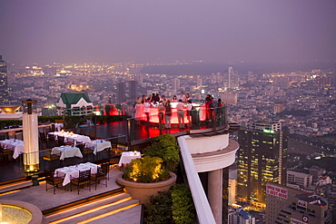 View over open air-bar Sirocco Sky Bar and Bangkok in the evening, State Tower, The Dome, Bangkok, Thailand