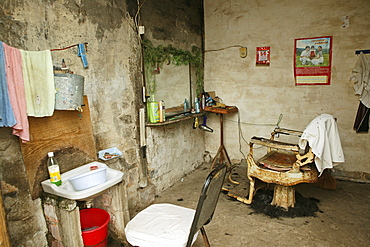 Interior view of a rural barbershop, Chengkun, China, Asia