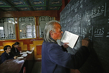 Music teacher and pupils, monks, Mount Wudang, Wudang Shan, Taoist mountain, Hubei province, UNESCO world cultural heritage site, birthplace of Tai chi, China