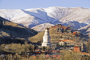 Mountains of Wutai Shan in winter, Five Terrace Mountain, Great White Pagoda, Northern Terrace, Buddhist Centre, town of Taihuai, Shanxi province, China