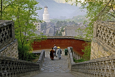 Stairs to Pusa Ding temple, White Pagoda, Xiantong Temple in the background, during birthday celebrations for Wenshu, Mount Wutai, Wutai Shan, Five Terrace Mountain, Buddhist Centre, town of Taihuai, Shanxi province, China