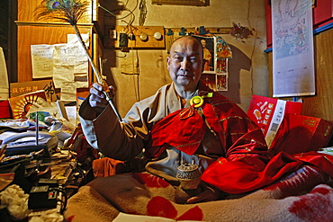 Abbot with peacock feather, Shi Neng Xiu of Santa Monastery, Wutai Shan, Buddhist holy Mountain, Shanxi province, China, Asia