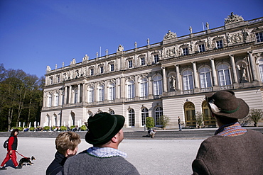 Tourists at Herrenchiemsee palace on Herrenchiemsee Island, Lake Chiemsee, Bavaria, Germany