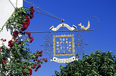 Wrought-iron sign for restaurant Zur Linde, Fraueninsel Island, Lake Chiemsee, Chiemgau, Upper Bavaria, Bavaria, Germany