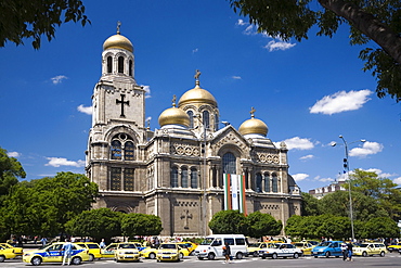 Cars in front of Chram Sveta Uspenie Bogorodicno cathedral at Varna, Bulgaria, Europe