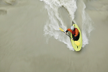 Man in a Kayak in the river Inn near Crazy Eddy in Silz, Haiming, Tyrol, Austria