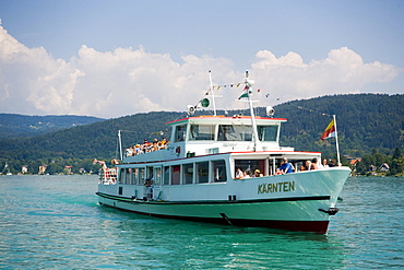 Excursion ship on the way to Maria Woerth, Lake Woerthersee (biggest lake of Carinthia), Maria Woerth, Carinthia, Austria