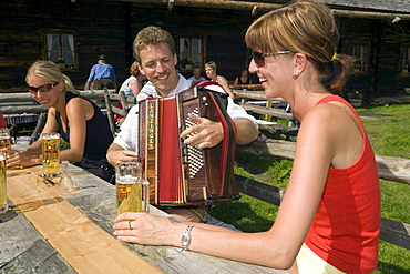 Man playing accordion, Bichlalm (1731 m), Grossarl Valley, Salzburg, Austria