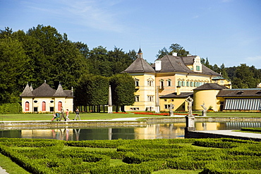 View over water parterre to Hellbrunn Palace and Crown Grotto, Salzburg, Salzburg, Austria