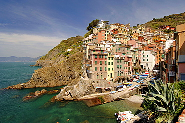 View over bay with marina to Riomaggiore, Cinque Terre, Liguria, Italy