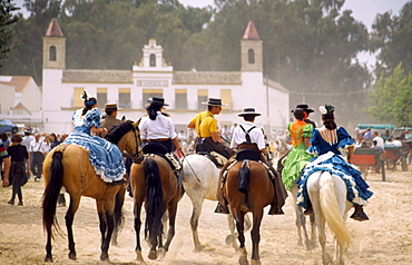 Spain, Andalucia, El Rocio, horse rirs in flamenco style at whitsan festival