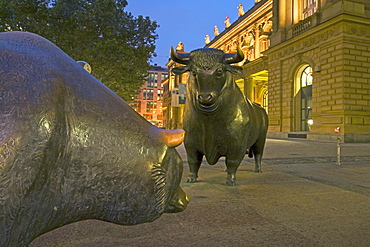 Germany, Frankfurt, stock exchange, bull and bear, twilight