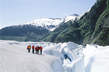 A group of people on a glacier tour near Juneau, Alaska, USA