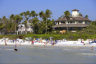 Municipal beach and homes in Naples, Florida, USA