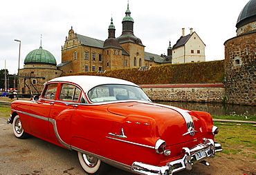 Castle with oldtimer in Vadstena, Oestergoetland, southern Sweden