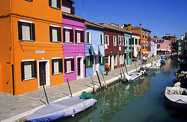 canal with boats and colourful houses in Burano, Venice, Venezia, Italy