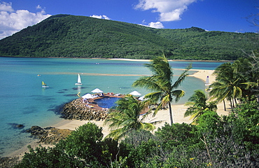 view to resort pool on Brampton Island. Carlisle Island in the background, Whitsunday Islands, Great Barrier Reef, Australia