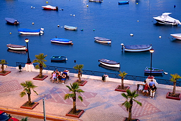 People at the promenade in the evening, Marsamxett Harbour, Sliema Creek, Sliema, Malta, Europe