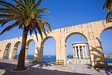 Arcades at the Lower Barracca Gardens under blue sky, Valletta, Malta, Europe