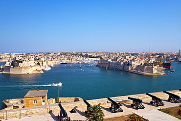 View from Valletta to the Three Cities under blue sky, Malta, Europe