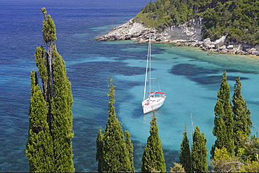 View of a boat in a bay on the Northeast coast, Paxos, Ionian Islands, Greece