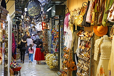 People standing in a shop in the Kambiello district of Corfu, Ionian Islands, Greece