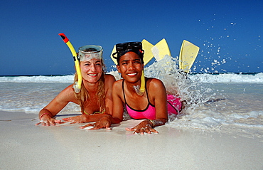 Two female scin diver on the beach, Punta Cana, Caribbean, Dominican Republic