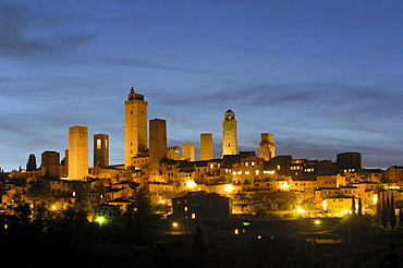 Panorama of a small medieval town at night, San Gimignano, Tuscany, Italy