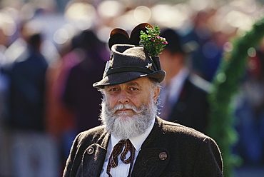 Portrait of a Bavarian man in traditional dress at a procession, Oktoberfest, Munich, Bavaria, Germany, Europe