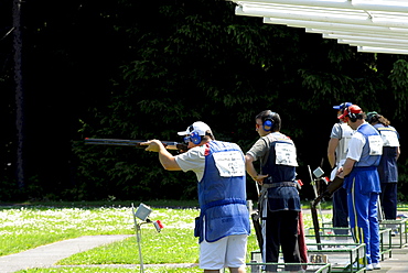 Five people standing at the firing range, Trap worldcup, Suhl, Thuringia, Germany