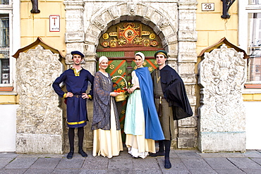 Actors in front of the entrance door of the Schwarzhaeupterhaus, Tallinn, Estonia, Europe