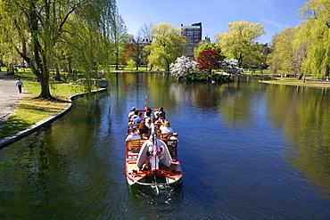 Tourists on a boat in The Public Gardens, Boston, Massachusetts, USA