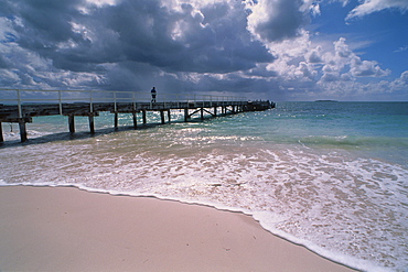 Person standing on jetty near Exmouth, Western Australia