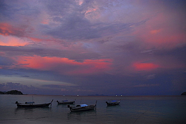 Evening sky and boats near the beach near Ko Lipe, Satun, Thailand