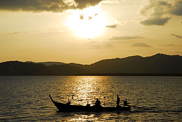 Boat in the evening light, bay of Phang Nga, Thailand