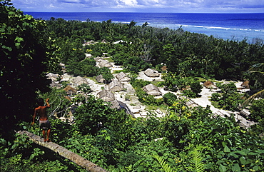 View at a boy and a village on Tikopia, Solomon Islands, Oceania