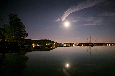 Refelction of the moon and sailing boats in the lake, Steinebach, Lake Woerthsee, Ipper Bavaria, Bavaria, Germany