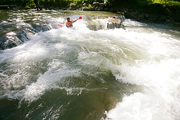 Man, participant on the Mangfall river, kayak weekend for beginners on the Mangfall river, Upper Bavaria, Germany