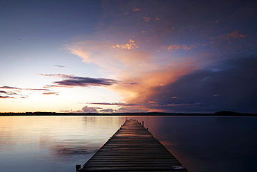 Jetty on a lake at sunrise, Madkroken near Vaexjoe, Smaland, Sweden