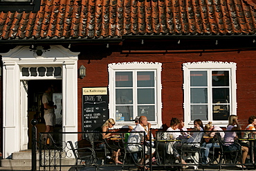 People sitting outside a street cafe, Kaffestugan, Visby, Gotland, Sweden