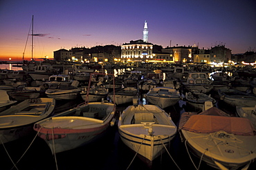 Boats in harbor, cityscape at night, Rovinj, Istria, Croatia