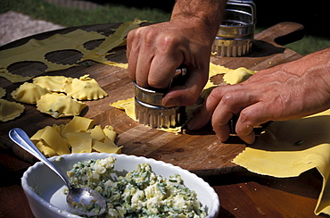 Man preparing pasta, restaurant La Campagnola, Salo, Lake Garda, Lombardy, Italy