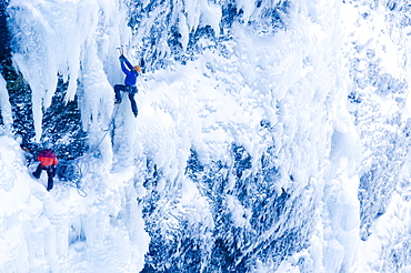 Ice climbing on icefall, Iceland