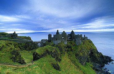 The ruins of Dunluce Castle on shore, County Antrim, Ireland, Europe